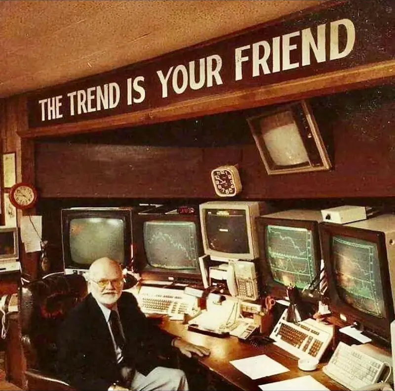 1990s NASDAQ trading floor with vintage CRT computers